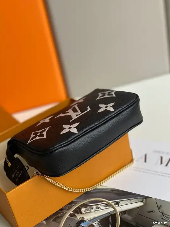 VUITTON POCHETTE ACCESSOIRES LOUIS MINI 0329